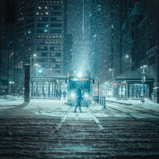 person standing in front of a train