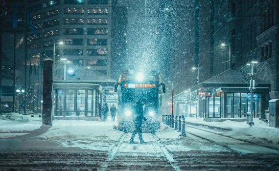 person standing in front of a train